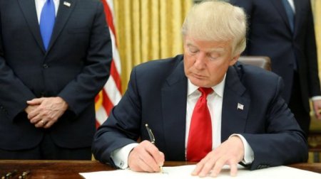 trump signing.jpg