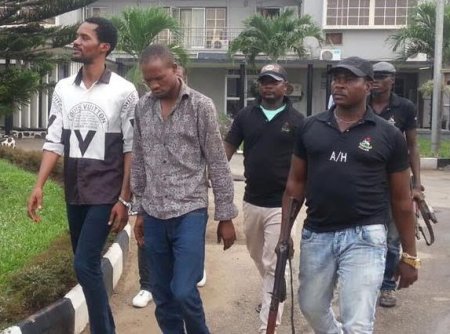 egbegbe handcuffed 3.jpg