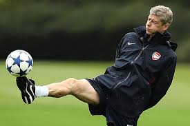 wenger plays ball.jpg